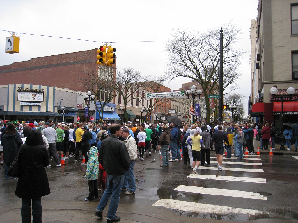 Shamrocks and Shenanigans 5K 2010 0020.jpg - The 2010 Shamrocks and Shenanigans 5K race in Ann Arbor MI. Cool and damp, and crowded. Then the crowd begins to gather closer to the starting line.